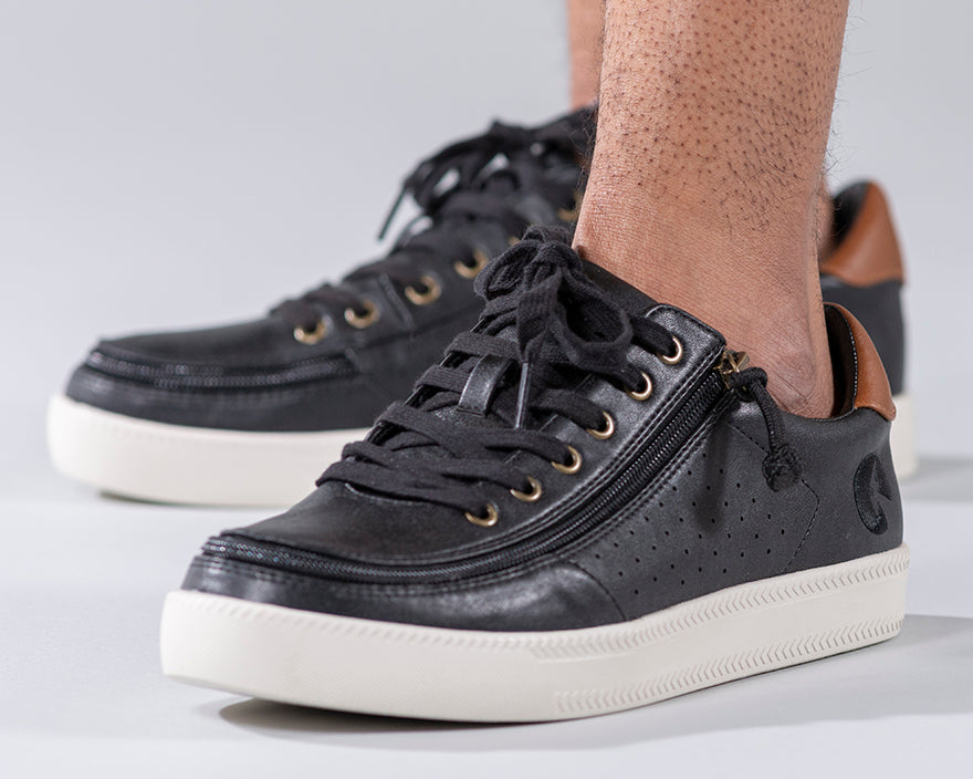 Men's Black BILLY Low Sneakers, zipper shoes, like velcro, that are adaptive, accessible, inclusive and use universal design to accommodate an afo. Footwear is medium and wide width, M, D and EEE, are comfortable, and come in toddler, kids, mens, and womens sizing.