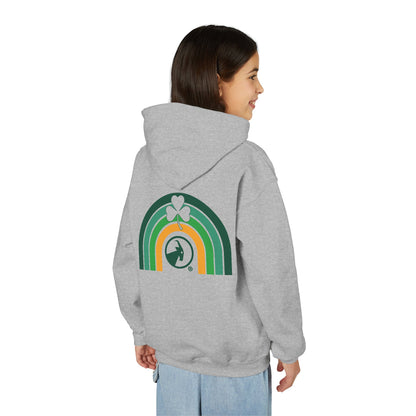 Person wearing a grey hoodie with a rainbow and clover design on the back, on a white background