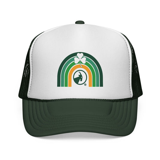 Trucker hat with a rainbow and clover design on a white background