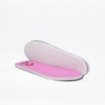 A pair of pink shoe insoles with white undersides—one flat, one propped—displayed on white, ideal for the SALE - Pink Print BILLY Classic Lace High from BILLY Footwear or other kids’ high top sneakers.