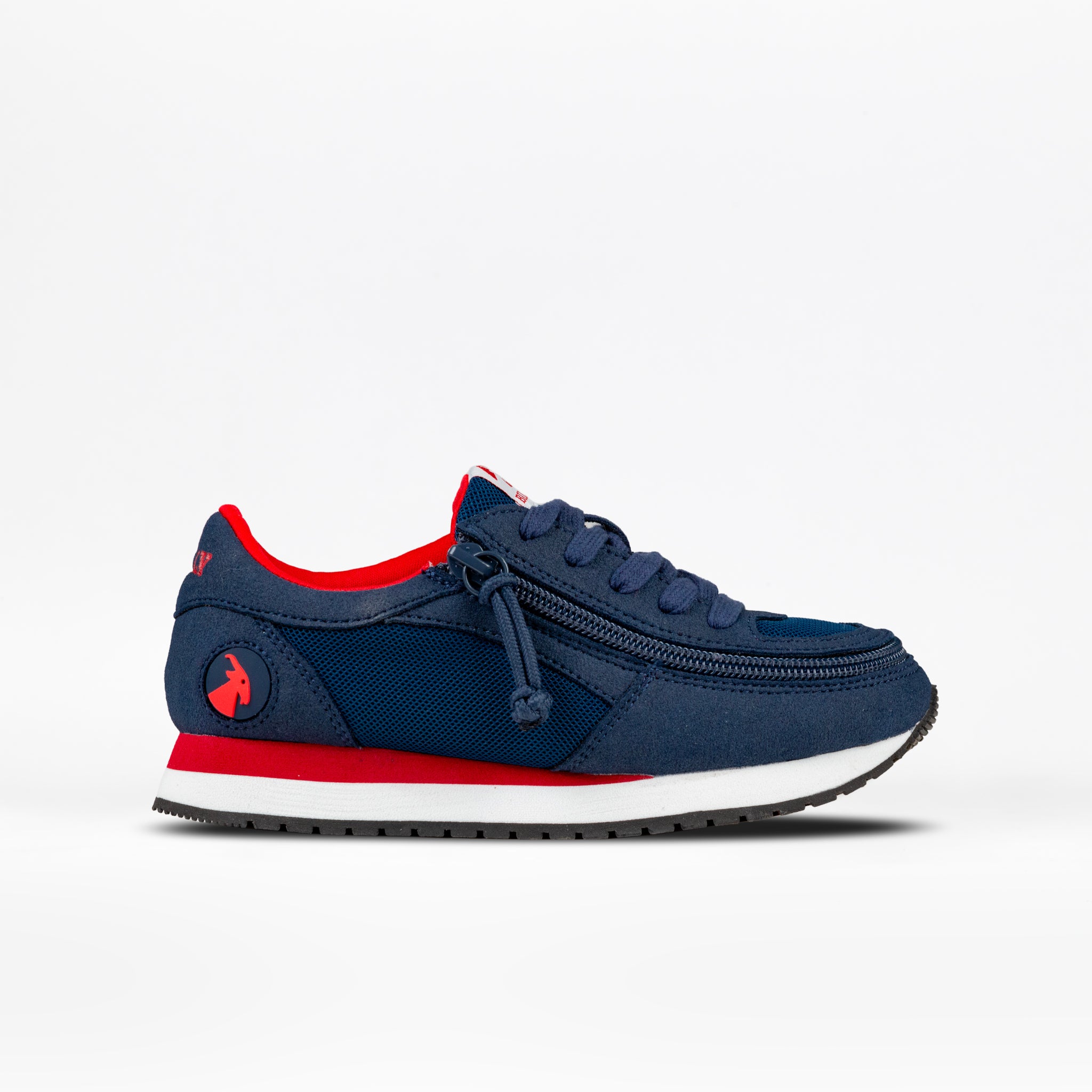 The Kids'/Toddler Joggers by BILLY Footwear feature a navy upper, red accents, white midsole, black outsole, side zipper, and a red unicorn logo on the heel with FlipTop Technology, shown on a white background.