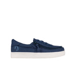 Navy blue sneaker with a white sole on a white background