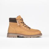 Tan lug boot with brown accents on a white background