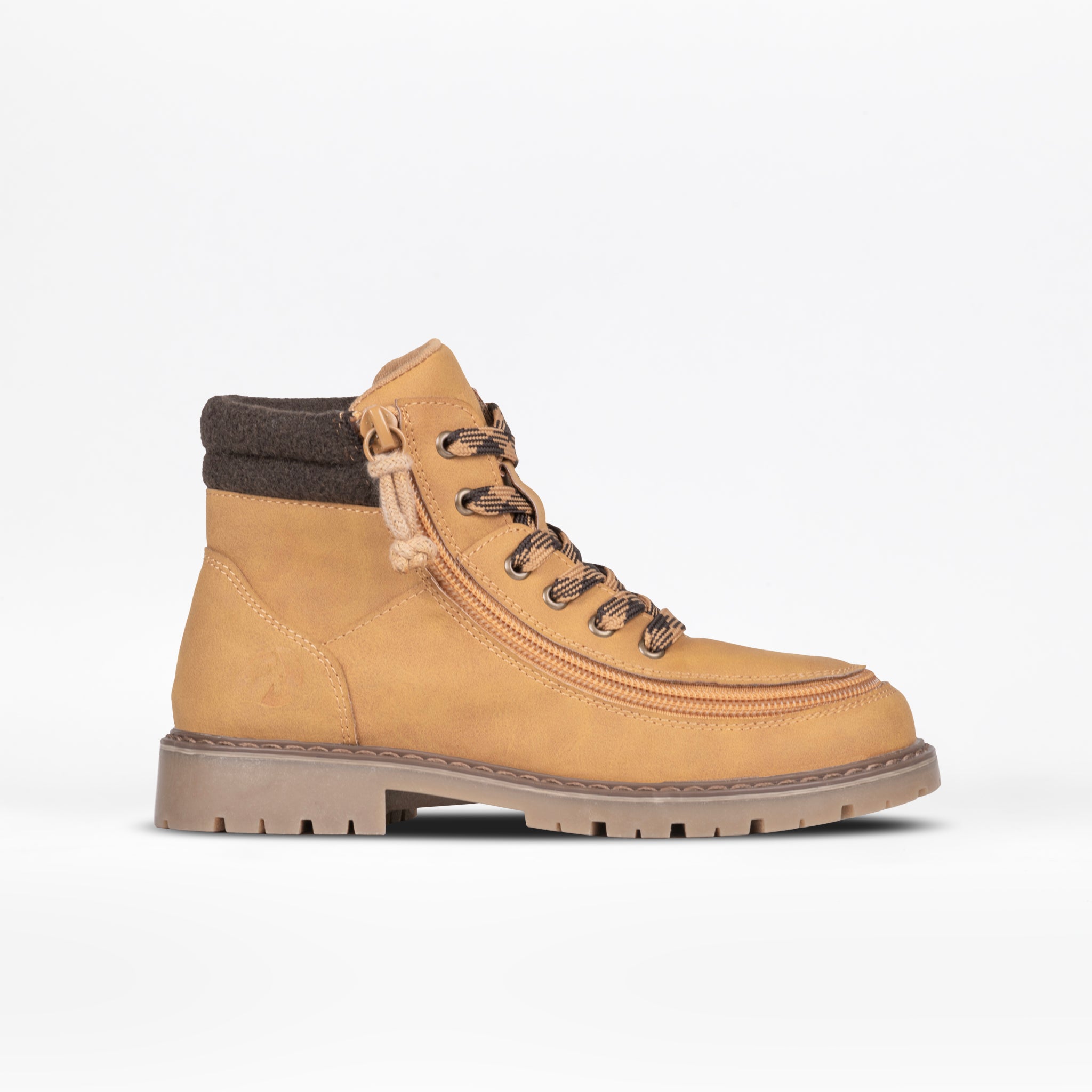 Tan lug boot with brown accents on a white background