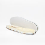 A pair of cream-colored, plush insoles with soft tops and white bottoms, perfect for enhancing comfort in your Chestnut BILLY Cozy Slipper by BILLY Footwear. Shown on a plain white background.