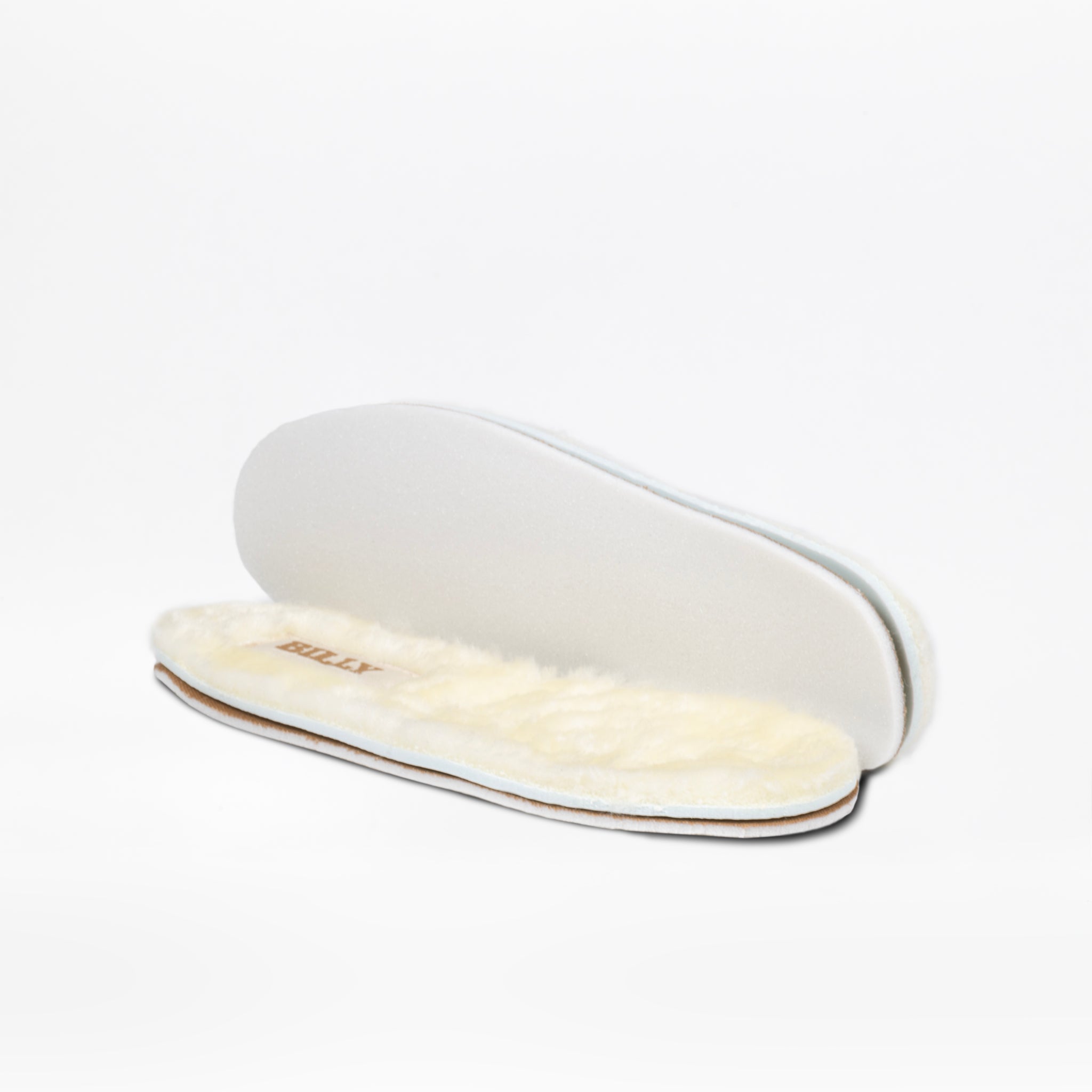 A pair of cream-colored, plush insoles with soft tops and white bottoms, perfect for enhancing comfort in your Chestnut BILLY Cozy Slipper by BILLY Footwear. Shown on a plain white background.