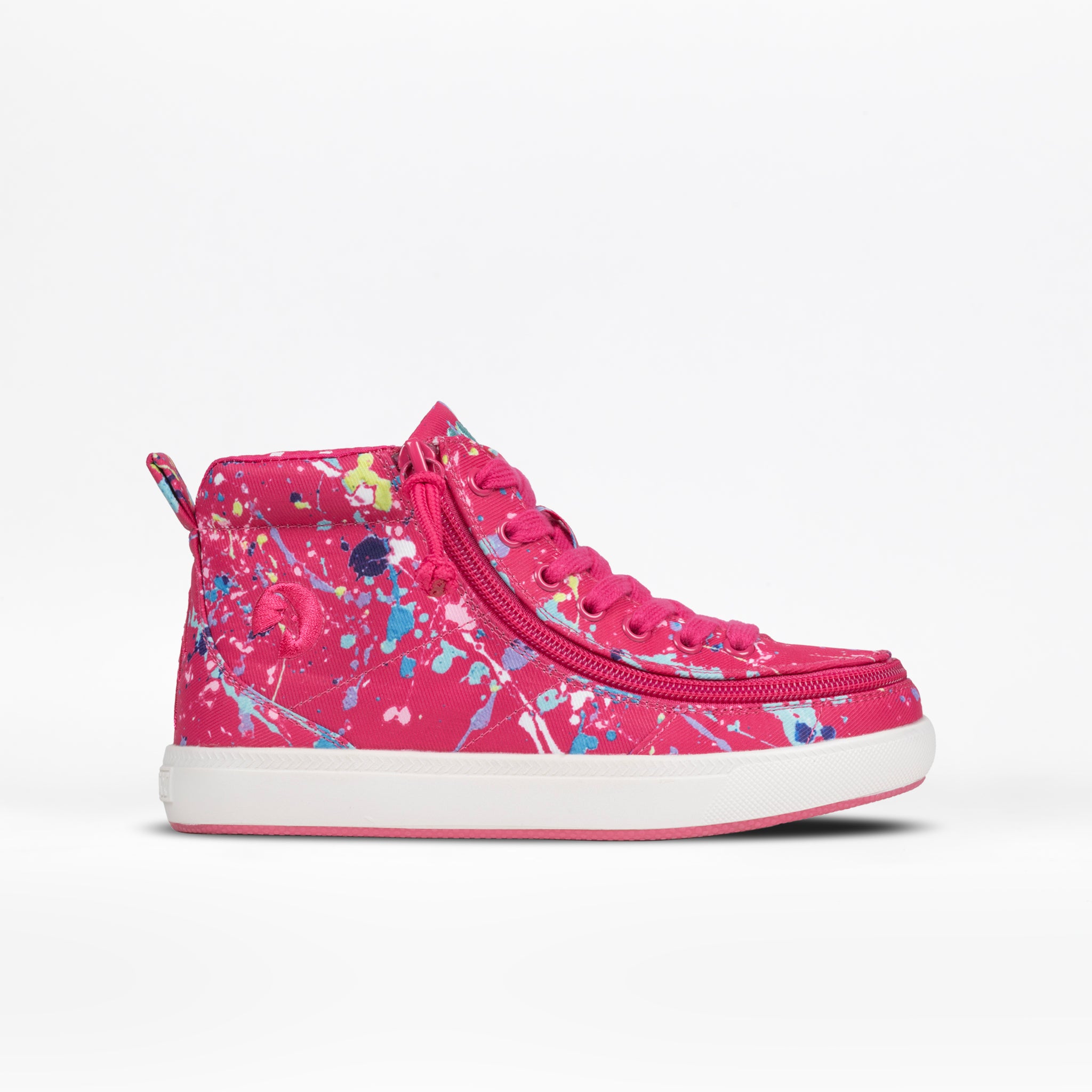 The BILLY Footwear Kids'/Toddler Classic D|R II High in Sasha Splatter is a bright pink high-top shoe with colorful blue, yellow, and white paint splatters, a wide toe box, side zipper, and white rubber sole, shown against a plain white background.