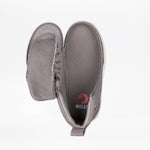 The Dark Grey BILLY Classic D|R II High by BILLY Footwear is a kids’ orthopedic shoe with a wide side flap, revealing the interior and red logo insole. Displayed on a white background, this adaptive AFO-friendly footwear offers support and comfort.