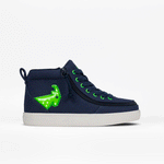 The BILLY Footwear Navy/Green Light Ups BILLY Classic D|R High is a navy high-top with a white sole, green eyelets, black laces, an exposed zipper, bright green arrow detail with white dots on the heel, and an AFO-friendly wide toe box.