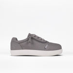 The SALE - Dark Grey BILLY D|R II Short Wrap Low by BILLY Footwear is a kids' adaptive gray sneaker with a white rubber sole, lace-up front, and side zipper, shown on a plain white background.