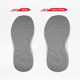 Two gray orthotic shoe soles for the SALE - White BILLY Goat from BILLY Footwear are shown side by side on a white background. The left is labeled Wide, the right Extra-Wide, demonstrating width options for AFO-friendly shoes.