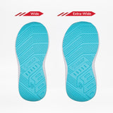 Two blue shoe soles from the BILLY Footwear Rainbow Tie Dye BILLY Goat kids adaptive shoes are shown side by side, labeled “Wide” and “Extra-Wide,” illustrating the width options ideal for orthotic use.