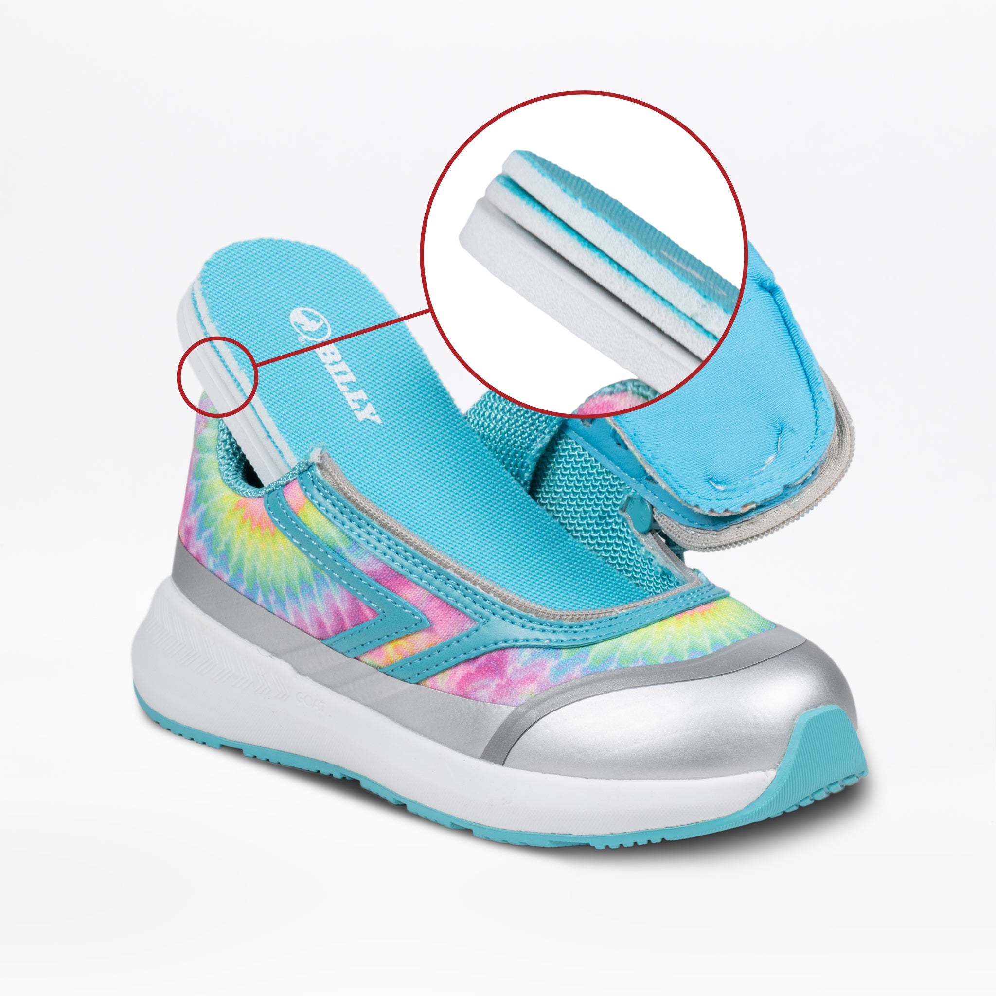 The BILLY Footwear Rainbow Tie Dye BILLY Goat is a vibrant sneaker with blue, silver, and rainbow details plus a close-up of the hook-and-loop heel strap—perfect for kids needing adaptive, AFO-friendly shoes.