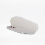 Two white insoles from the Silver Glitz BILLY CS High by BILLY Footwear—one lays flat displaying a small logo while the other stands to show its side, both on a white background.