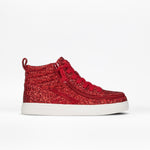 The BILLY Footwear Ruby Red Glitz BILLY CS High is a kids' high-top sneaker in shimmering red glitter with matching laces, a visible side zipper, and a white rubber sole, shown against a plain white background.
