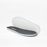 A pair of SALE - Smoke/Lime Fire BILLY Sport Inclusion insoles by BILLY Footwear, one flat showing a dark gray top with white sides, the other propped up to reveal a white bottom, displayed on a plain white background.