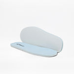 A pair of light blue foam insoles, with one lying flat and the other propped up behind it on a white background—ideal for the SALE - Sky Blue BILLY Sport Inclusion shoes by BILLY Footwear.