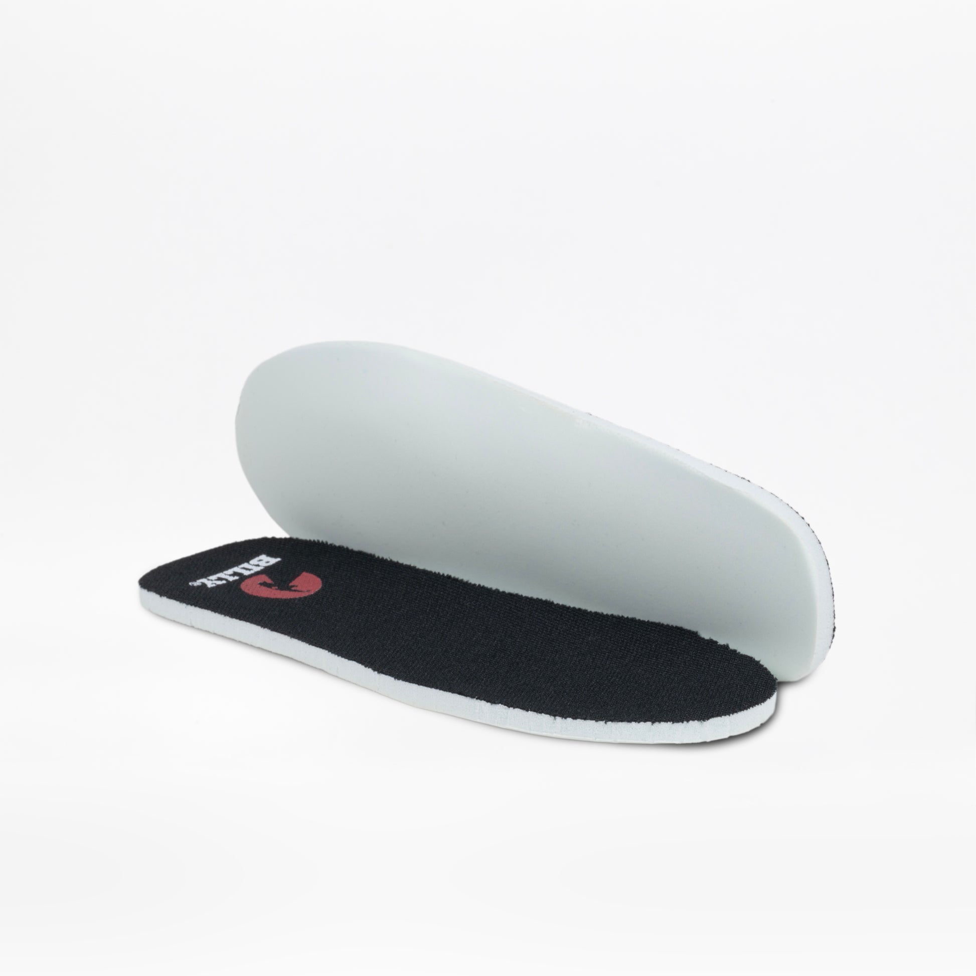 A pair of black and white orthotic-grade insoles, one flat and one upright, displayed on a white background—designed for the Black BILLY Retro Jogger kids' shoes by BILLY Footwear.