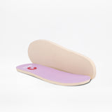 A pair of light beige insoles with light purple fabric tops from BILLY Footwear are shown on a white background—ideal for pairing with the Lilac BILLY Retro Jogger.