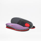 The Lilac Watercolor BILLY Limitless insoles by BILLY Footwear for kids’ orthopedic shoes feature a purple mesh top, red cushioning, and black textured soles. On a white background, one insole shows the top and the other displays the underside.