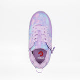 Top view of the Lilac Watercolor BILLY Limitless orthopedic kids' shoe by BILLY Footwear, featuring a pastel lavender and pink tie-dye pattern, lavender laces, side zipper, "LIMITLESS" on the tongue, and a red Billy logo on the insole. White background.