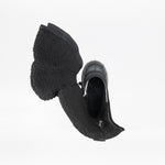 Top view of a single Black BILLY Ice Boot by BILLY Footwear, open to reveal the warm, fuzzy lining and insulated material for kids, shown against a white background.