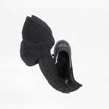 Top view of a single Black BILLY Ice Boot by BILLY Footwear, open to reveal the warm, fuzzy lining and insulated material for kids, shown against a white background.