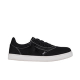 Black sneaker with white sole on a white background