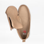 The Men's Sand Suede BILLY Comfort Chukka by BILLY Footwear features a wraparound zipper with the upper flap open to the side, revealing a red insole logo and "BILLY" text. The shoe has a perforated toe and white sole.