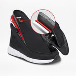 The Men's Black/White BILLY Goat Classic High by BILLY Footwear is displayed partially open to showcase its layered insole, designed for orthotic use. A circular inset highlights the cushioning and supportive materials inside the shoe.