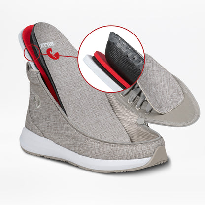 The Women's Grey Jersey BILLY Goat Classic High by BILLY Footwear features a lifted upper showing its removable insole. A red circle highlights the black heel section of the insole above the shoe, set on a white background.