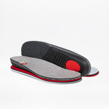 A pair of gray and black BILLY Footwear insoles with red accents—one flat to reveal the textured top, one propped up to show the treaded bottom and red cushioned heel pad—for Men's Grey Jersey BILLY Goat Classic High shoes.