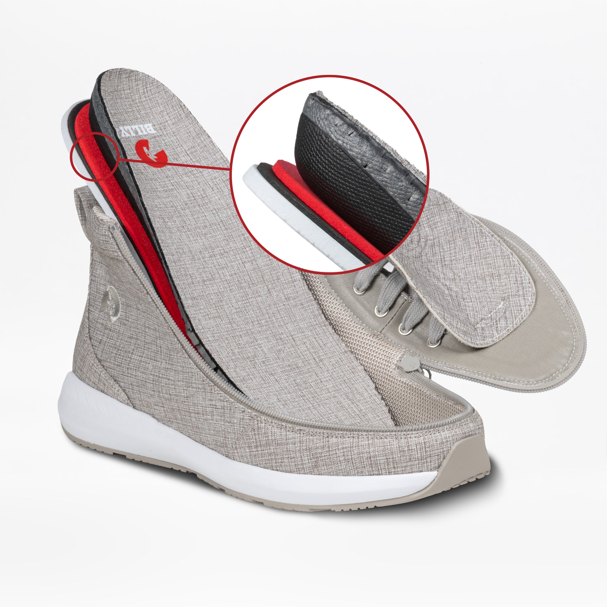 A Men's Grey Jersey BILLY Goat Classic High sneaker by BILLY Footwear is cut open, revealing foam, mesh, and fabric layers inside. A red circle highlights its construction. The wide-fit shoe has white soles and textured grey jersey fabric.
