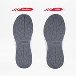 Two gray Men's Charcoal BILLY Sport Inclusion shoe soles by BILLY Footwear are shown side by side on a white background. The left sole is labeled Medium, the right is labeled Wide, highlighting the shoes’ inclusive fit.