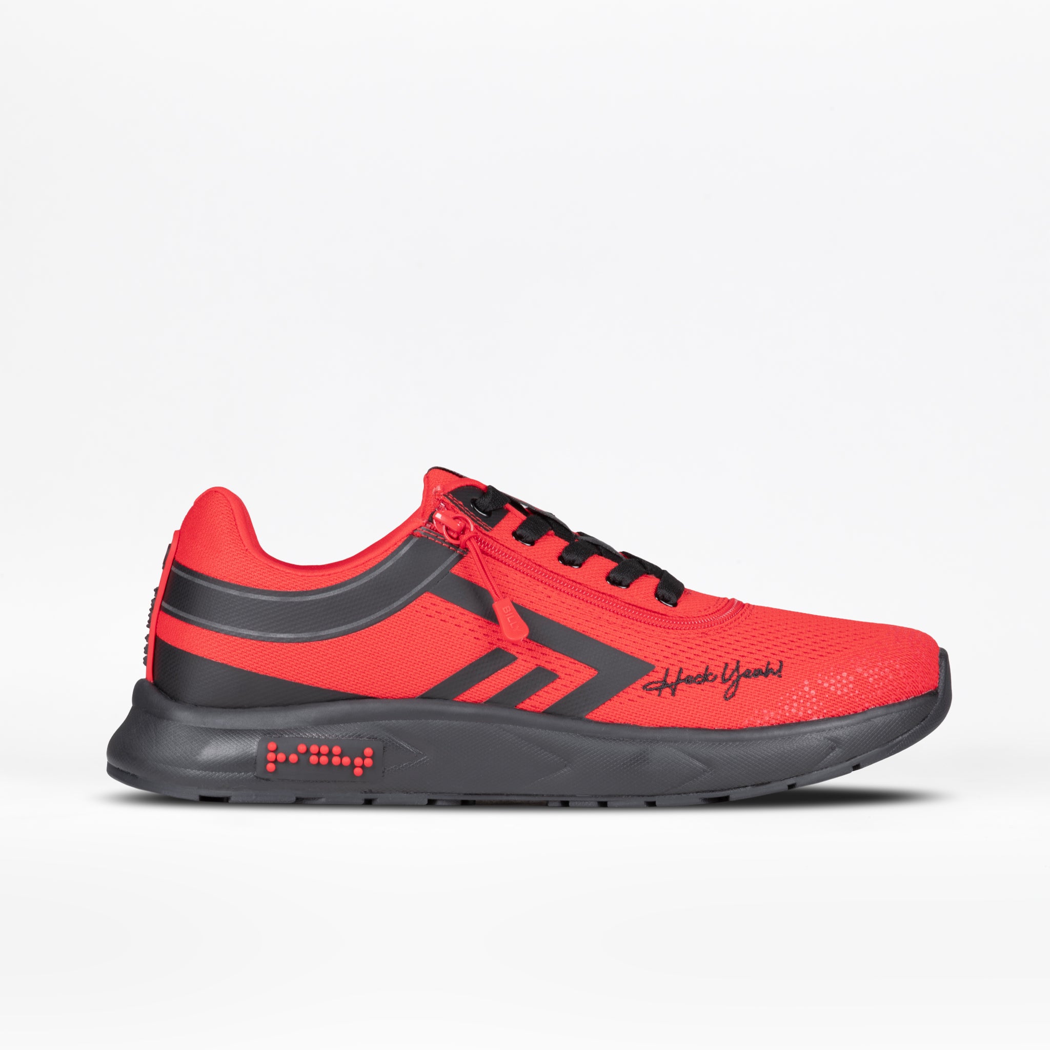 The BILLY Footwear Men's Sport Inclusion sneaker features a red color with black accents, black laces and sole, a stripe design, "Heck Yeah!" on the side, and a cushioned insole for comfort.
