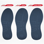Three blue insoles labeled Medium, Wide, and Extra-Wide are displayed side by side to show the width options available for the Men's White/Navy BILLY Comfort Court from BILLY Footwear.