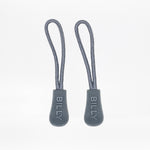 Two grey zipper pulls with 'BILLY' branding on a white background
