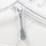Light Grey sport zipper pull with BILLY word mark attached to a white shoe