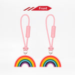 Two rainbow-shaped keychains with pink strings on a white background