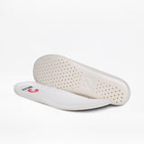 Two white shoe insoles, one showing the fabric top with a logo and one showing the perforated underside.