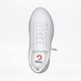 Top-down view of a white sneaker with a side zipper and a red ‘BILLY’ logo on the insole.