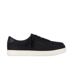 Black sneaker with a zipper on a white background