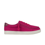 Pink sneaker with a white sole on a white background