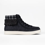 Black high-top sneaker with plaid cuff on a white background