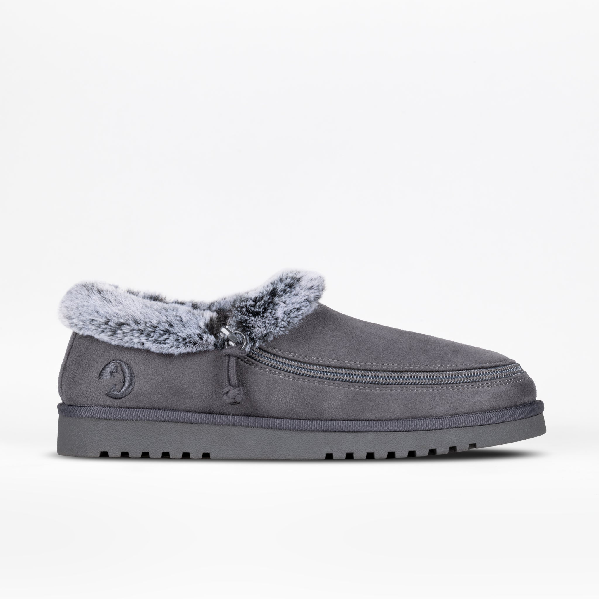 The BILLY Footwear Women's Cozy Slipper in charcoal features a textured sole, faux fur lining, and a full wrap zipper on the upper, shown against a plain white background.