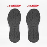 Two black soles from the Women's Black/White BILLY Sport Inclusion by BILLY Footwear are displayed side by side, labeled Medium and Wide, showing tread pattern similarities and multiple width options for comfortable women's sneakers.