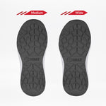 Two black shoe soles for the Women's Stone Floral BILLY Sport Inclusion by BILLY Footwear are shown side by side, labeled “Medium” and “Wide.” Both feature a geometric tread and "BILLY," fitting women's athletic zipper shoes with cushioned insoles.