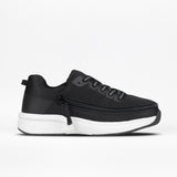 The Women's Black BILLY Limitless by BILLY Footwear features a mesh upper, laces, side zipper for easy on/off, and a white sole. Displayed on a plain white background.