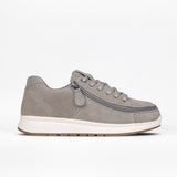 The Women's Grey Suede BILLY Comfort Plush by BILLY Footwear is shown from the side, featuring matching laces, a wraparound zipper, white cushioned sole, and tan outsole against a plain white background.