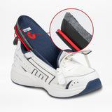 A Women’s White/Navy BILLY Limitless 253 sneaker by BILLY Footwear is cut open, revealing the layered materials in its heel and sole, while a red circle highlights these inner features of this sensory-friendly shoe.
